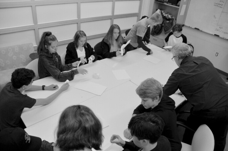 students sitting around a table